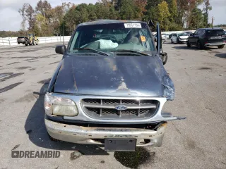 1998 Ford Explorer XLT с VIN 1FMZU32P3WZB05199, выставлен на аукционе Copart как лот 79951194 с пробегом 209 673 миль миль и Списание • Salvage title. История ставок и продаж доступна на DreamBid. Изображение 5.