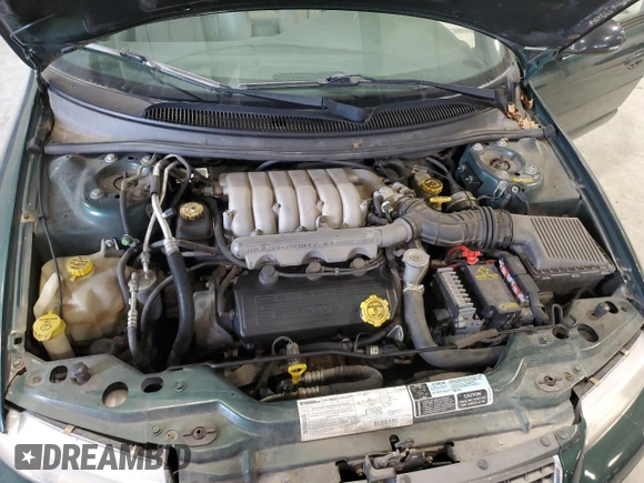 1999 Chrysler Cirrus LXi z VIN 1C3EJ56H6XN600228, wystawiony jako Copart lot #86002314 z przebiegiem 42 402 mil mil oraz Czysty tytuł • Clean title. Historia ofert i sprzedaży dostępna na DreamBid. Obrazek 11.