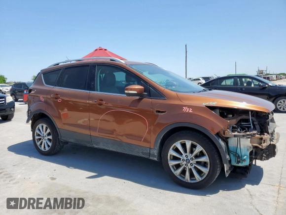 2017 Ford Escape Titanium with VIN 1FMCU0JD3HUA31410, listed as a Copart auction lot 52729025 with 68,256 mi miles and Salvage Title. Bid and sale history available at DreamBid. Image 4.