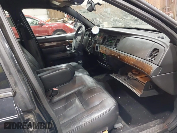 2008 Mercury Grand Marquis LS z VIN 2MEFM75V18X617284, wystawiony jako IAAI lot #41948364 z przebiegiem 106 294 mil mil oraz . Historia ofert i sprzedaży dostępna na DreamBid. Obrazek 5.