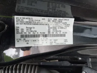 2014 Ford Focus SE with VIN 1FADP3K27EL199542, listed as a IAAI auction lot 42071908 with 142,180 mi miles. Bid and sale history available at carsss.com. Image 9.