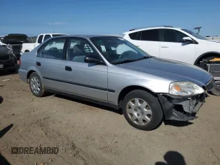 1999 Honda Civic LX with VIN 2HGEJ6677XH506586, listed as a Copart auction lot 48595735 with 86,159 mi miles and Salvage Title. Bid and sale history available at carsss.com. Image 4.