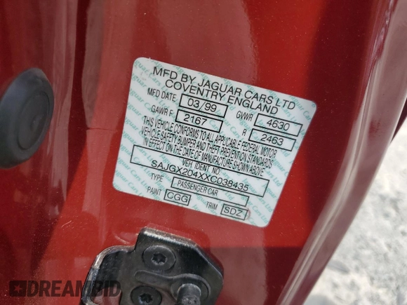 1999 Jaguar XK with VIN SAJGX204XXC038435, listed as a Copart auction lot 64843714 with Not Provided miles and Salvage Title. Bid and sale history available at DreamBid. Image 13.