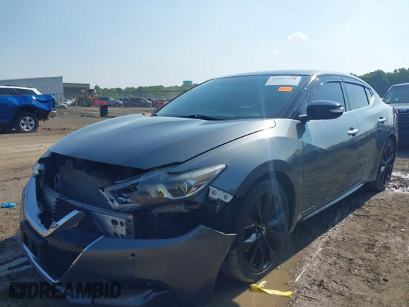 2017 Nissan Maxima SV z VIN 1N4AA6AP7HC454942, wystawiony jako IAAI lot #42447538 z przebiegiem 199 525 mil mil oraz . Historia ofert i sprzedaży dostępna na DreamBid. Obrazek 18.