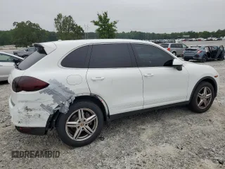 2014 Porsche Cayenne with VIN WP1AA2A21ELA95833, listed as a Copart auction lot 58572195 with 145,073 mi miles and Salvage title. Bid and sale history available at DreamBid. Image 3.