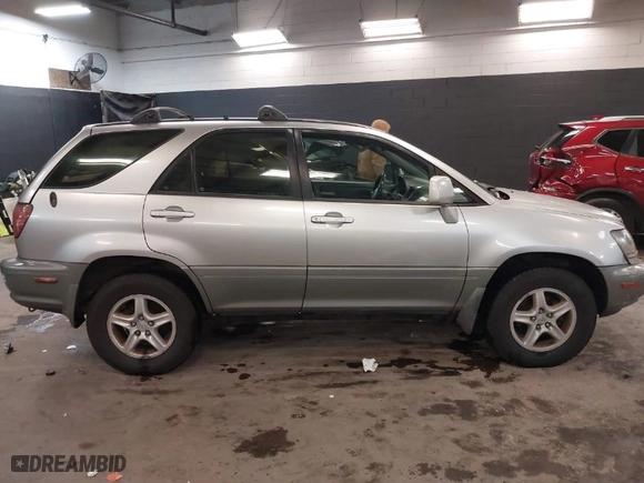 1999 Lexus RX 300 Luxury SUV with VIN JT6HF10U8X0065898, listed as a IAAI auction lot 38515585 with NaN miles. Bid and sale history available at carsss.com. Image 13.