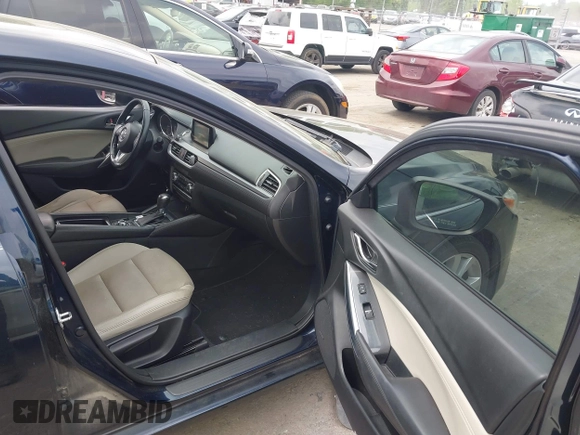 2016 Mazda Mazda6 i Touring with VIN JM1GJ1V59G1402867, listed as a IAAI auction lot 41998212 with 135,724 mi miles. Bid and sale history available at carsss.com. Image 5.