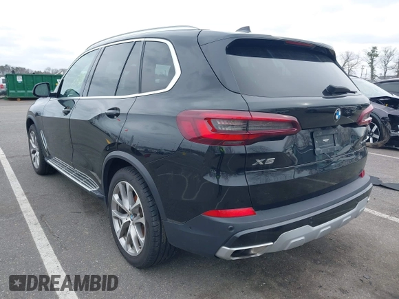 2023 BMW X5 xDrive40i with VIN 5UXCR6C0XP9P90557, listed as a IAAI auction lot 41860825 with 49,737 mi miles. Bid and sale history available at carsss.com. Image 3.