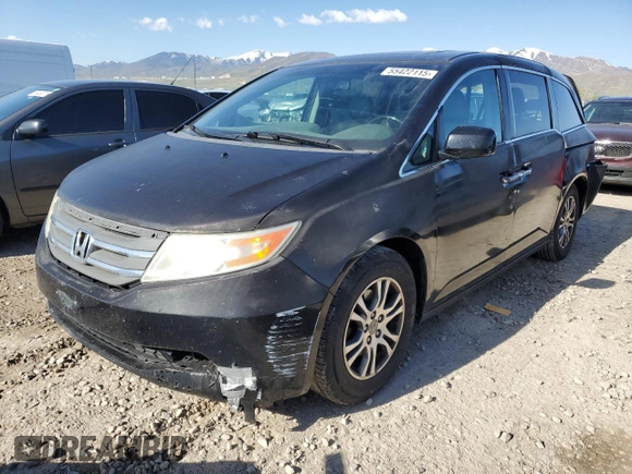 2012 Honda Odyssey EX-L with VIN 5FNRL5H69CB141594, listed as a Copart auction lot 55422115 with 181,745 mi miles and Salvage Title. Bid and sale history available at DreamBid. Image 1.