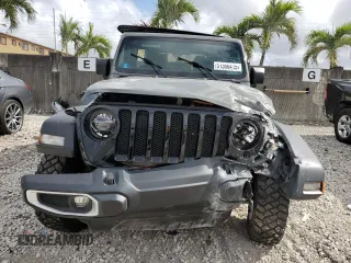 2021 Jeep Wrangler Unlimited Willys with VIN 1C4HJXDM6MW628041, listed as a Copart auction lot 51366415 with 22,697 mi miles and Salvage title. Bid and sale history available at DreamBid. Image 5.