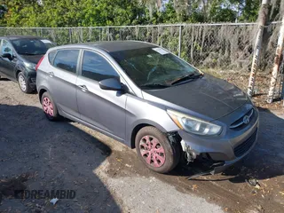 2015 Hyundai Accent GS with VIN KMHCT5AE5FU216886, listed as a IAAI auction lot 41062053 with 176,738 mi miles. Bid and sale history available at carsss.com. Image 1.