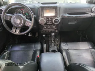 2012 Jeep Wrangler Unlimited Sahara z VIN 1C4HJWEG1CL168435, wystawiony jako Copart lot #58431615 z przebiegiem 120 364 mil mil oraz Szkoda całkowita • Salvage title. Historia ofert i sprzedaży dostępna na DreamBid. Obrazek 8.