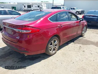 2018 Ford Fusion SE with VIN 3FA6P0HDXJR149729, listed as a IAAI auction lot 42431325 with 91,250 mi miles and . Bid and sale history available at DreamBid. Image 4.