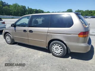 2004 Honda Odyssey LX with VIN 5FNRL18574B102634, listed as a Copart auction lot 54669075 with 141,057 mi miles and Salvage title. Bid and sale history available at DreamBid. Image 2.