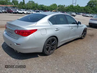 2015 Infiniti Q50 with VIN JN1BV7AP6FM354690, listed as a IAAI auction lot 42410614 with 98,527 mi miles and . Bid and sale history available at DreamBid. Image 4.