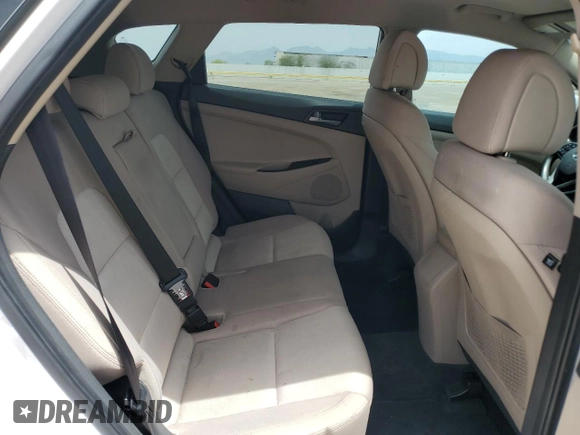2016 Hyundai Tucson SE z VIN KM8J23A4XGU243394, wystawiony jako Copart lot #56556265 z przebiegiem 91 305 mil mil oraz Szkoda całkowita • Salvage title. Historia ofert i sprzedaży dostępna na DreamBid. Obrazek 10.