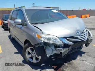 2015 Toyota Sienna LE AAS with VIN 5TDKK3DC6FS631351, listed as a IAAI auction lot 42648256 with 92,873 mi miles and . Bid and sale history available at DreamBid. Image 1.