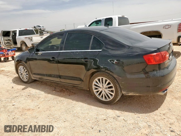 2014 Volkswagen Jetta TDI w/Premium with VIN 3VW3L7AJ2EM443384, listed as a Copart auction lot 56748125 with 137,987 mi miles and Salvage title. Bid and sale history available at DreamBid. Image 2.