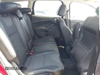 2013 Ford Escape Titanium with VIN 1FMCU0J96DUA57425, listed as a IAAI auction lot 40458653 with 121,929 mi miles. Bid and sale history available at carsss.com. Image 8.