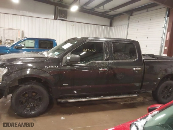 2015 Ford F-150 XLT w/HD Payload Pkg with VIN 1FTFW1EG8FFB59391, listed as a IAAI auction lot 41520010 with 119,414 mi miles. Bid and sale history available at carsss.com. Image 14.