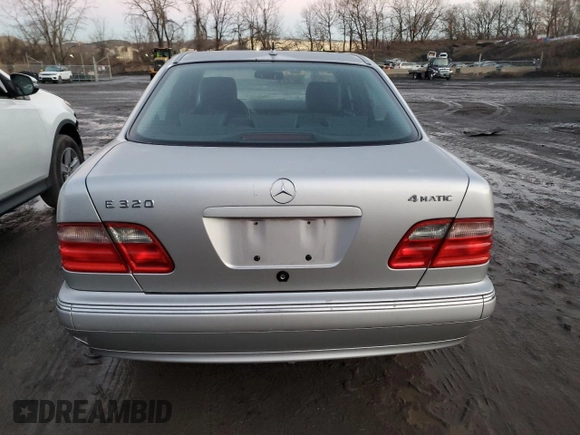 2002 Mercedes-Benz E-Class with VIN WDBJF82J32X066803, listed as a Copart auction lot 85474614 with 77,358 mi miles and Salvage Title. Bid and sale history available at carsss.com. Image 6.