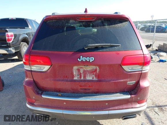2015 Jeep Grand Cherokee Summit with VIN 1C4RJEJG9FC100568, listed as a IAAI auction lot 42512705 with 128,413 mi miles and . Bid and sale history available at DreamBid. Image 16.