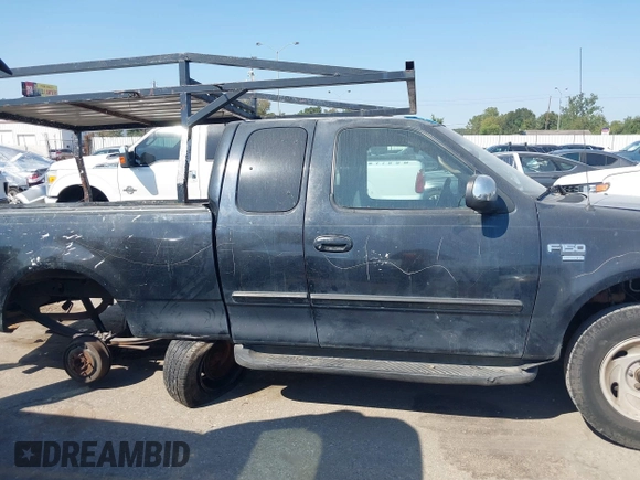 1999 Ford F-150 с VIN 1FTRX17W5XNA42082, выставлен на аукционе IAAI как лот 40599993 с пробегом Не указан миль и . История ставок и продаж доступна на DreamBid. Изображение 13.