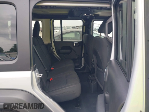 2023 Jeep Wrangler Sport with VIN 1C4HJXDG2PW508235, listed as a IAAI auction lot 42127823 with 25,069 mi miles and . Bid and sale history available at DreamBid. Image 8.