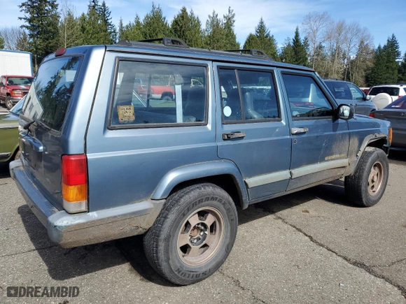 1999 Jeep Cherokee Sport with VIN 1J4FT68S3XL577599, listed as a Copart auction lot 50081715 with 182,974 mi miles and Clean Title. Bid and sale history available at carsss.com. Image 3.