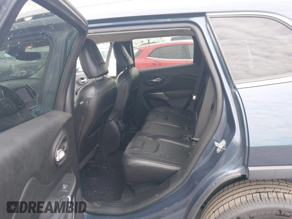 2021 Jeep Cherokee Latitude Lux with VIN 1C4PJLMX2MD107165, listed as a IAAI auction lot 42456893 with 62,625 mi miles and . Bid and sale history available at DreamBid. Image 8.