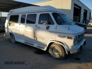 1993 Chevrolet Chevy Van z VIN 1GBEG25K1PF325078, wystawiony jako Copart lot #82640544 z przebiegiem 115 462 mil mil oraz Czysty tytuł • Clean title. Historia ofert i sprzedaży dostępna na DreamBid. Obrazek 4.