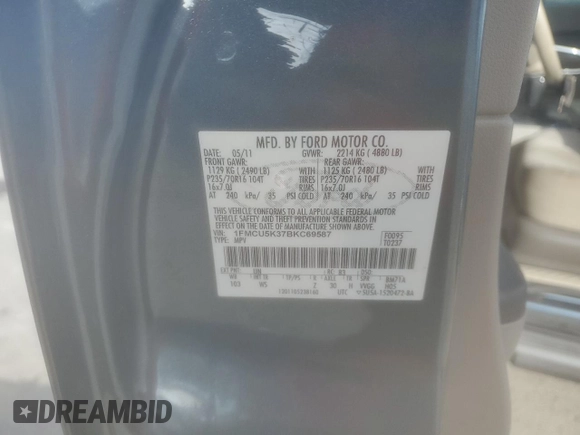 2011 Ford Escape Hybrid with VIN 1FMCU5K37BKC69587, listed as a Copart auction lot 68494964 with 126,353 mi miles and Salvage title. Bid and sale history available at DreamBid. Image 12.