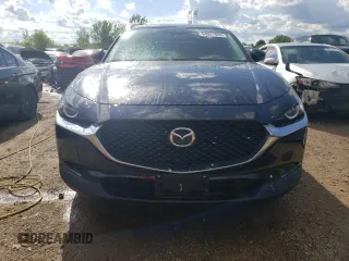 2022 Mazda CX-30 2.5 Turbo with VIN 3MVDMBAY0NM447128, listed as a Copart auction lot 54007924 with 10,596 mi miles and Salvage Title. Bid and sale history available at DreamBid. Image 5.