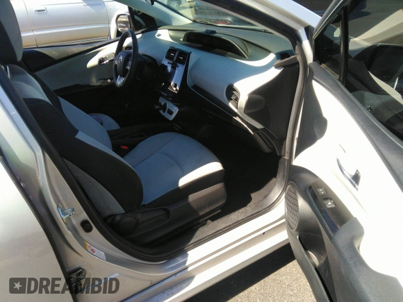 2017 Toyota Prius Two z VIN JTDKBRFU1H3551324, wystawiony jako IAAI lot #41893385 z przebiegiem 305 445 mil mil oraz . Historia ofert i sprzedaży dostępna na DreamBid. Obrazek 5.