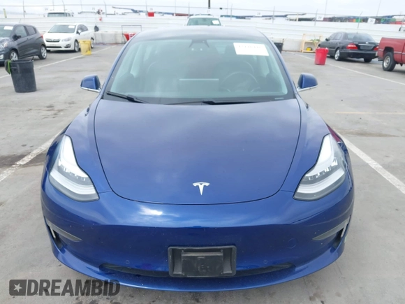 2020 Tesla Model 3 Standard Range Plus z VIN 5YJ3E1EA7LF705809, wystawiony jako IAAI lot #42146416 z przebiegiem 52 056 mil mil oraz . Historia ofert i sprzedaży dostępna na DreamBid. Obrazek 13.