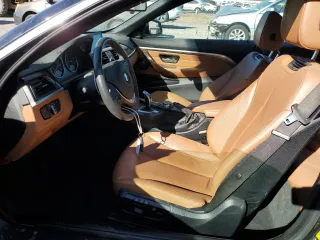 2014 BMW 4 Series 428i xDrive with VIN WBA3T1C55EPS98364, listed as a Copart auction lot 38431574 with 69,984 mi miles and Salvage Title. Bid and sale history available at carsss.com. Image 7.