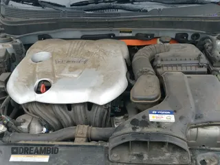 2012 Hyundai Sonata Hybrid z VIN KMHEC4A45CA041482, wystawiony jako IAAI lot #42919659 z przebiegiem 188 249 mil mil oraz . Historia ofert i sprzedaży dostępna na DreamBid. Obrazek 14.