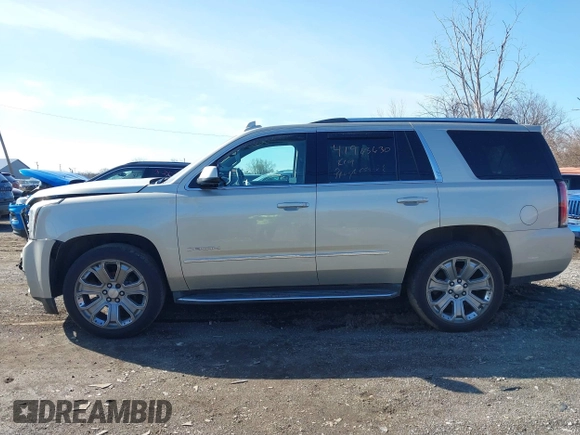 2016 GMC Yukon Denali with VIN 1GKS2CKJ5GR393269, listed as a IAAI auction lot 41963630 with 158,584 mi miles and . Bid and sale history available at DreamBid. Image 14.