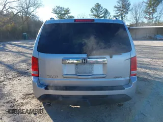 2015 Honda Pilot EX-L with VIN 5FNYF4H57FB006655, listed as a IAAI auction lot 41822385 with 125,915 mi miles and . Bid and sale history available at carsss.com. Image 15.