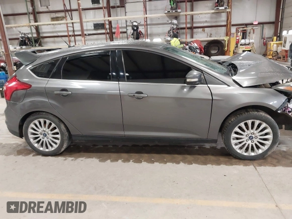 2012 Ford Focus Titanium with VIN 1FAHP3N27CL313288, listed as a IAAI auction lot 41741895 with 140,376 mi miles and . Bid and sale history available at carsss.com. Image 14.