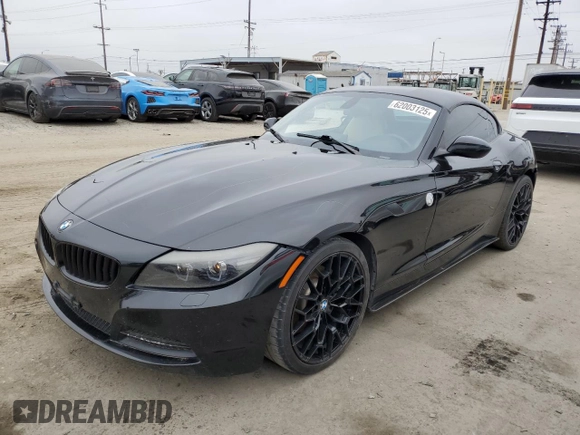 2012 BMW Z4 sDrive28i with VIN WBALL5C56CE716558, listed as a Copart auction lot 62003125 with 93,438 mi miles and Salvage title. Bid and sale history available at DreamBid. Image 1.