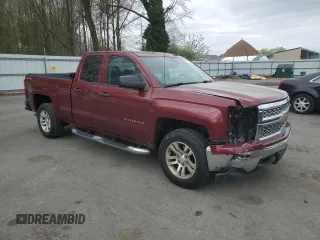 2014 Chevrolet Silverado 1500 LT with VIN 1GCVKREHXEZ392202, listed as a Copart auction lot 54003005 with 130,597 mi miles and Salvage Title. Bid and sale history available at DreamBid. Image 4.