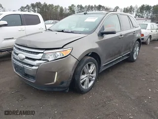2012 Ford Edge SEL with VIN 2FMDK3J9XCBA67679, listed as a IAAI auction lot 41690401 with 191,536 mi miles. Bid and sale history available at carsss.com. Image 2.
