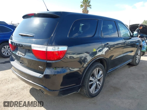 2013 Dodge Durango R/T with VIN 1C4SDHCT2DC530301, listed as a IAAI auction lot 42008853 with 186,148 mi miles and . Bid and sale history available at DreamBid. Image 4.