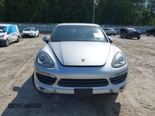 2012 Porsche Cayenne S Hybrid z VIN WP1AE2A20CLA92424, wystawiony jako IAAI lot #42315279 z przebiegiem 129 119 mil mil oraz . Historia ofert i sprzedaży dostępna na DreamBid. Obrazek 12.