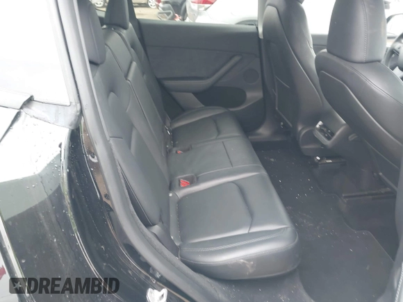 2023 Tesla Model Y Long Range with VIN 7SAYGDEEXPA044335, listed as a IAAI auction lot 42350159 with 26,731 mi miles and . Bid and sale history available at DreamBid. Image 8.