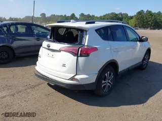 2017 Toyota RAV4 LE with VIN JTMBFREVXHD209590, listed as a IAAI auction lot 40332211 with 50,426 mi miles. Bid and sale history available at carsss.com. Image 4.
