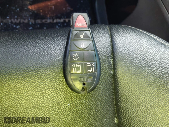 2014 Chrysler Town & Country S with VIN 2C4RC1HGXER225397, listed as a IAAI auction lot 41023867 with 180,093 mi miles and . Bid and sale history available at DreamBid. Image 11.