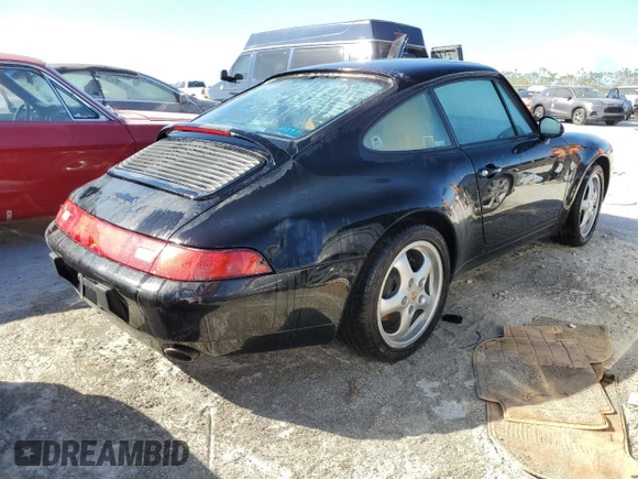 1995 Porsche 911 Carrera with VIN WP0AA2990SS323244, listed as a Copart auction lot 77215074 with 0 mi miles and Non Repairable. Bid and sale history available at carsss.com. Image 3.