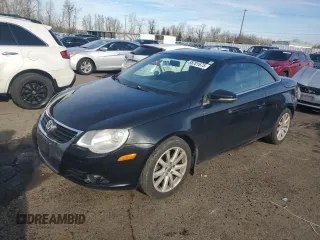 2009 Volkswagen Eos Komfort with VIN WVWBA71F19V021652, listed as a Copart auction lot 88701675 with 171,298 mi miles and Salvage Title. Bid and sale history available at DreamBid. Image 1.
